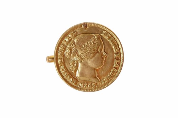 Broche dorado moneda