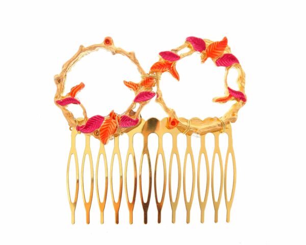 Peinecillo dorado de hojas pintado en naranja y rosa