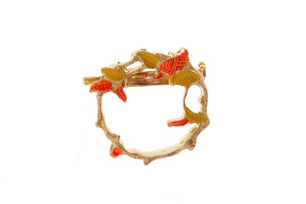 Broche dorado de enredadera de hojas pintado en naranja y amarillo