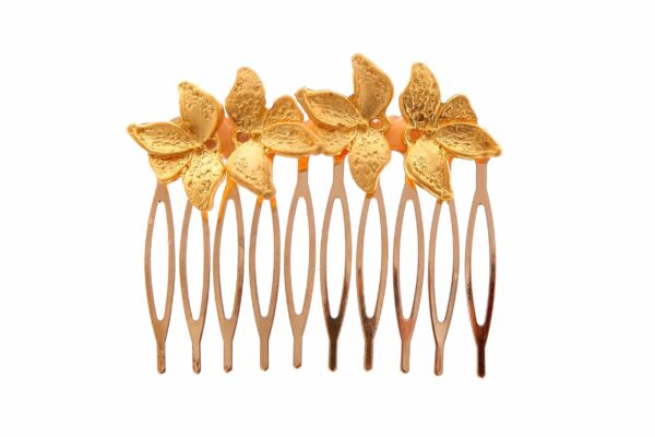 Peinecillo dorado con conjunto de hojas