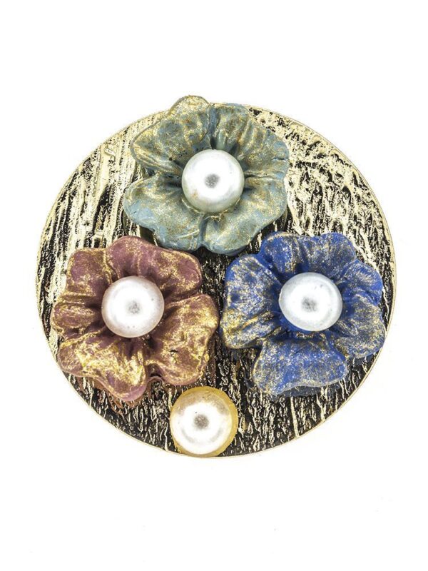Broche de porcelana multicolor con reflejos dorados