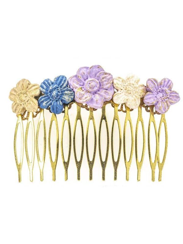 Peinecillo de porcelana en tonos lila, beige y azul con reflejos dorados